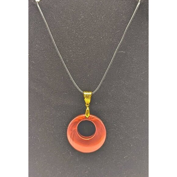 Red Circular Pendant Necklace With Gold Bail On Black Cord - Picture 3 of 5
